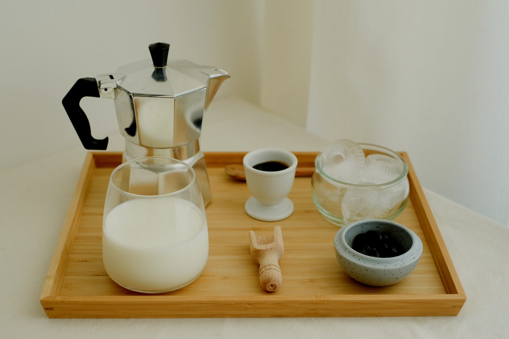 Ingredients and Tools in Making Coffee in Wooden Tray